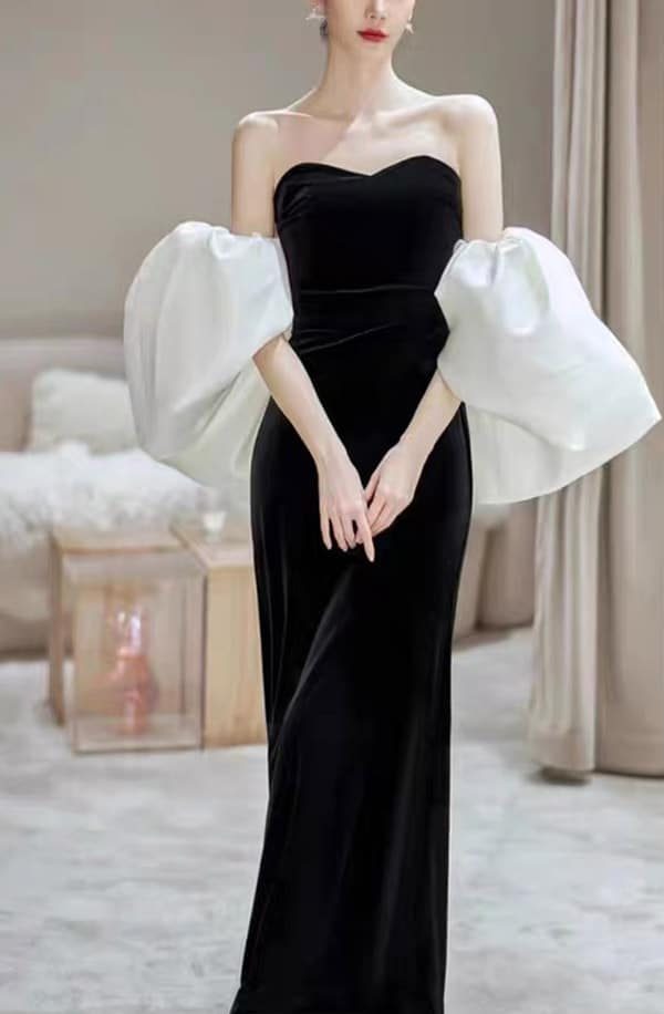 Schwarzes Brautkleid im Mermaid-Stil mit weißen Volumenärmeln – Vorderansicht, LAFANTA Night Fall Collection Berlin